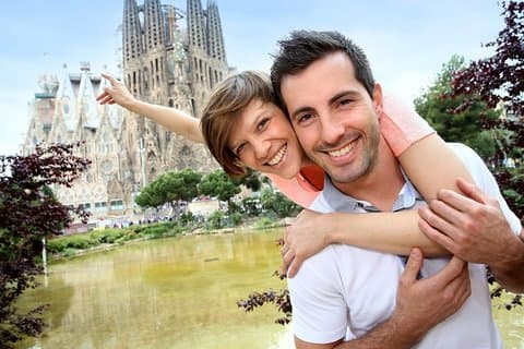 Couple in front of the Holy Family
