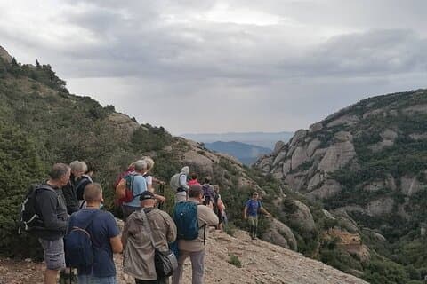 Hiking with a group of French people, from the Monastery to the hermitages of San Juan and San Onofre and back