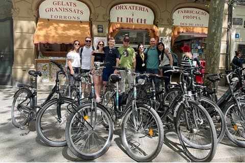 Group picture with the bikes in a break stop