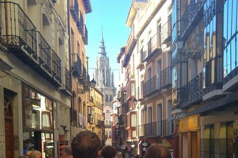 Narrow street with impressive view of the tower