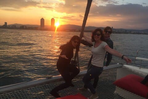 Enjoying the best sunset on a sailboat in Barcelona