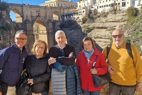 Group posing in front of the Puente Nuevo de Ronda.