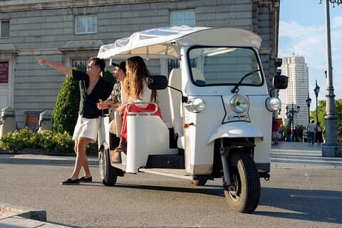 "Madrid: Panoramic views in Tuk Tuk with pickup available"