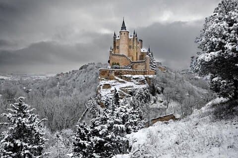 Travel through Segovia and Avila in a Small Group from Madrid