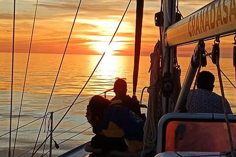 Sunset sailing along the cliffs of Maro- Private