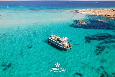 Formentera Boat Trip with Open Bar, Meals & Sunset Options