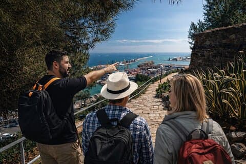 Private tour guide showing port view from Montjuïc Barcelona