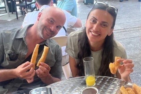 Traditional Spanish breakfast with churros and chocolate in Malaga