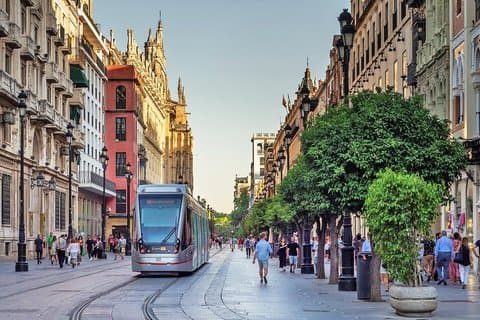 The Avenida de la Constitución pedestrian street with the tram (photo by Ajay Suresh)
