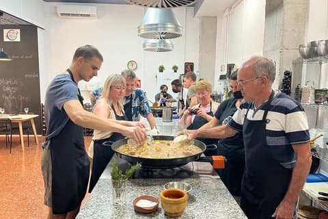 Seafood Paella cooking class Sangria workshop & Local Market