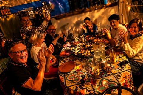 Sunset rooftop paella with local chef in palma