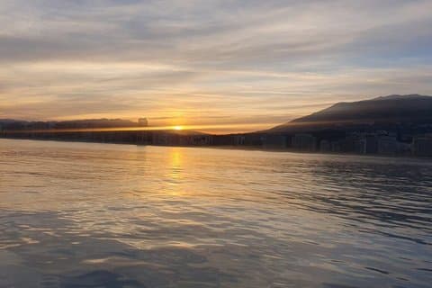Sunset on Luxury Yacht Includes a Drink