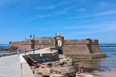 Tour of the Castles and Caleta Beach