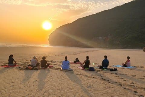 Yoga at sunrise and sunset on Berria Beach