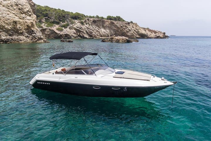 Sunseeker 29 anchored in crystal clear water