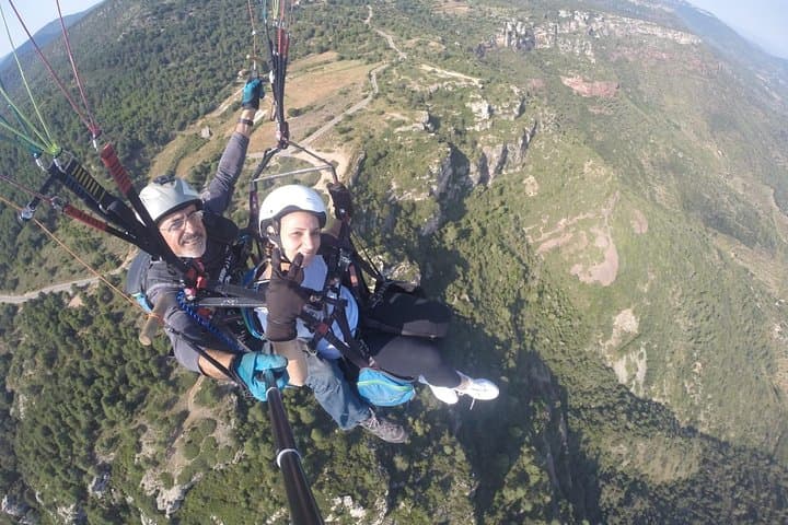 paragliding at the mountains with hotel pickup