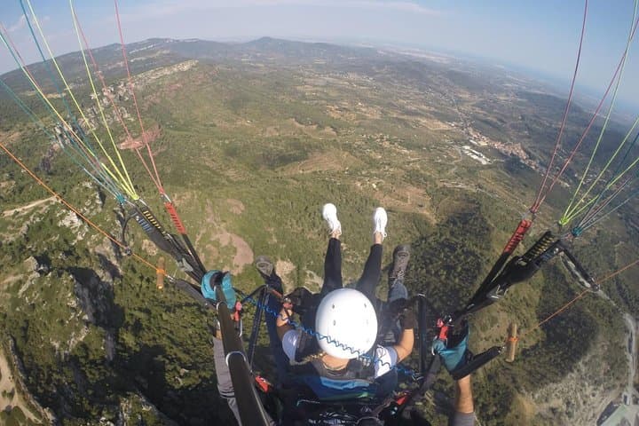 paragliding at the mountains with hotel pickup