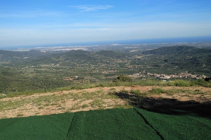 paragliding at the mountains with hotel pickup