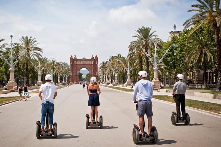 Segway group gliding past Arc de Triomf, Barcelona Segway Tour