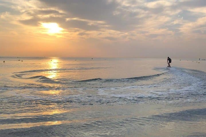 Sunrise with electric board Awake