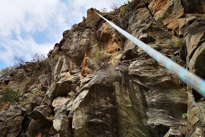 Rock climbing in natural space.