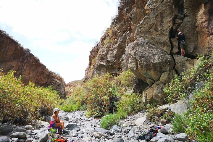 Rock climbing in natural space.