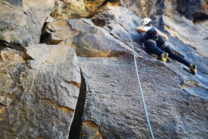 Rock climbing in natural space.