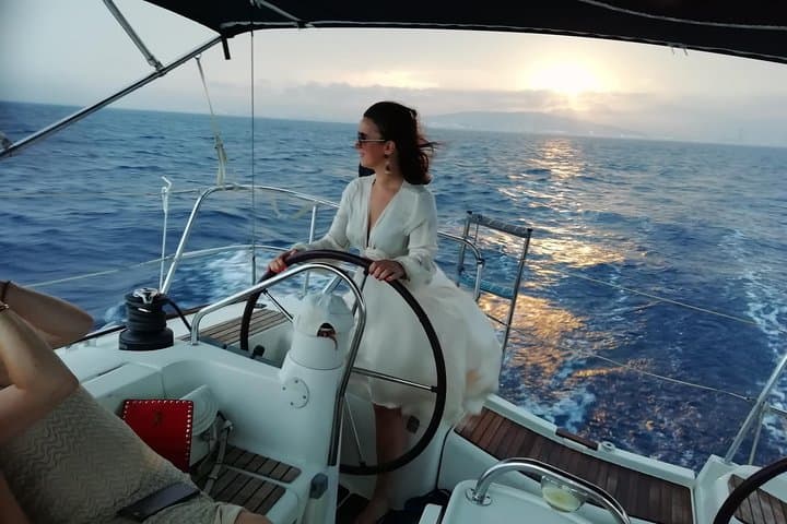 A exclusive sunset sail in front of Barcelona coast.