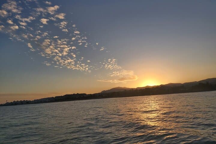 Sunset by boat in Marbella