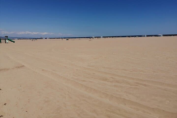 Stand Up Paddling Boarding Tour and Paella Lunch in Valencia