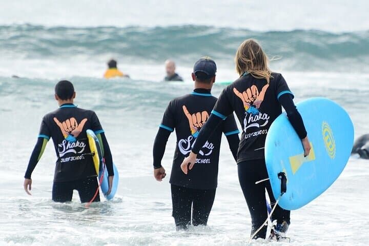 Group Surf Class in Playa de Las Américas with Photographs