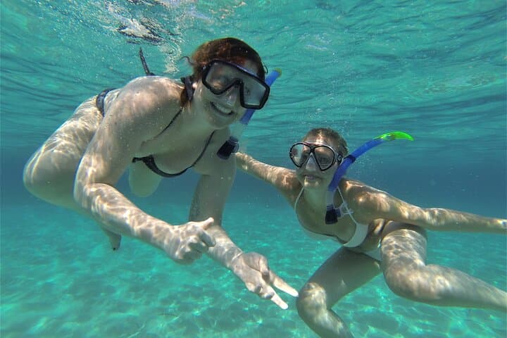 Snorkeling in ibiza with blue waters
