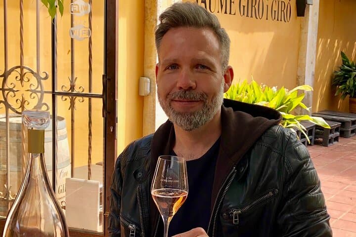 Tour guide Michael enjoying premium Cava