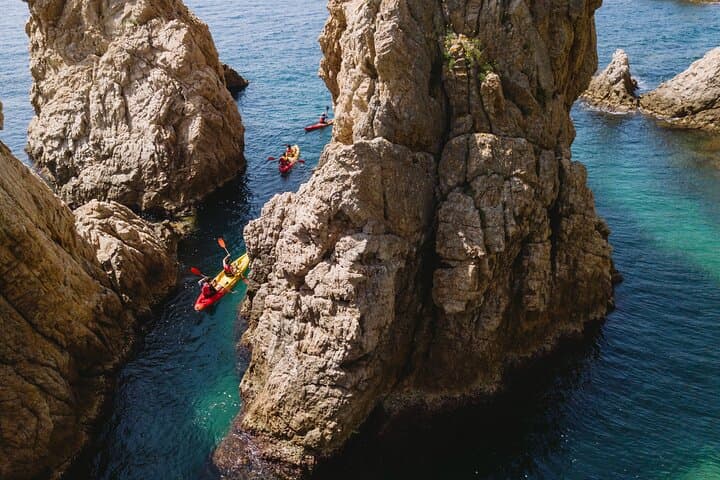 Tossa de Mar: Kayak & Snorkel Tour with Paella from Barcelona