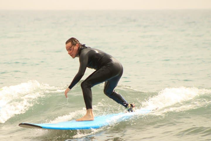Surf student riding a wave – Gran Canaria surf lessons.