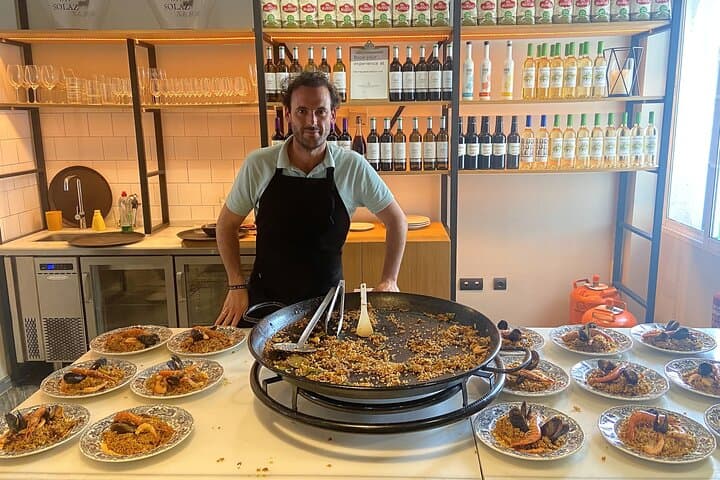 Seville: Rooftop Paella Showcooking and Sangría