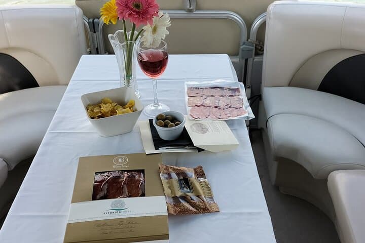 Exclusive Seville Boat Tour with Shared Tapas