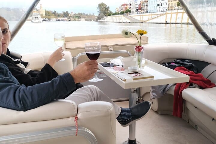 Exclusive Seville Boat Tour with Shared Tapas
