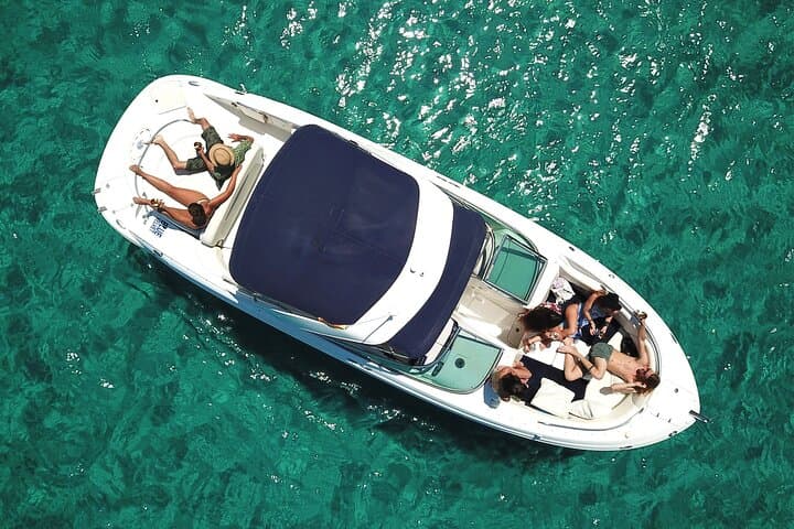 Private 7-hour boat ride from Sant Antoni de Portmany