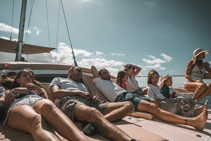 Clients sunbathing on the catamaran