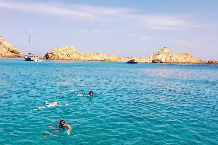 A refreshing swim in Cala Pregonda