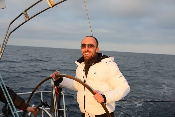 Enjoying the experience of steering the sailboat
