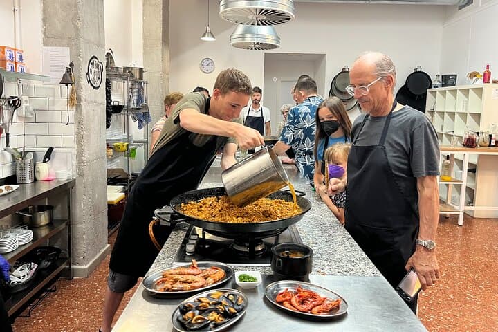Seafood Paella cooking class Sangria workshop & Local Market