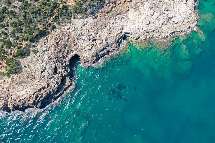 Excursion to the Cova Tallada with optional swimming stop Denia