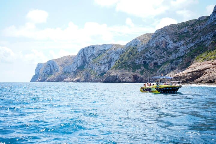 Excursion to the Cova Tallada with optional swimming stop Denia