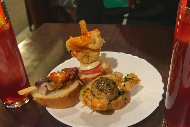 Barcelona Street Food Tour with Local Market & City Center Visit