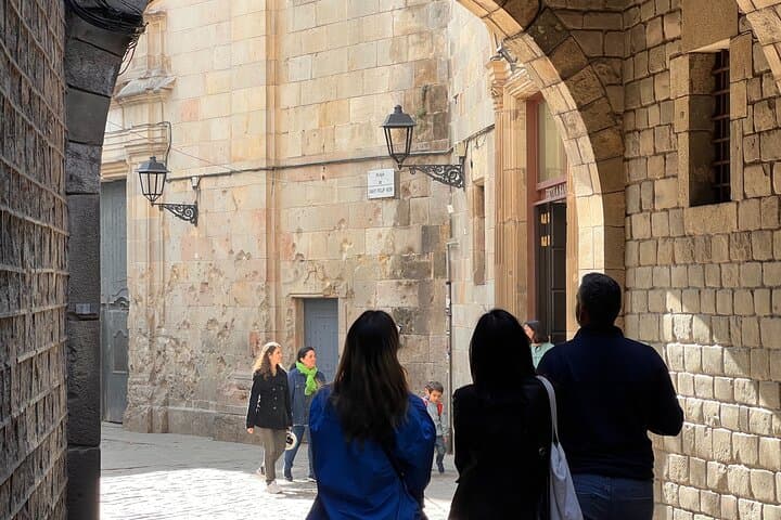 Visitors strolling through Barcelona's Barri Gotic