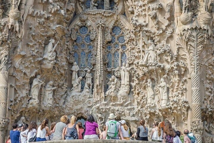 Group observing the Nativity Facade
