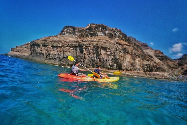 Kayak around the Mogan Caves and Cliffs