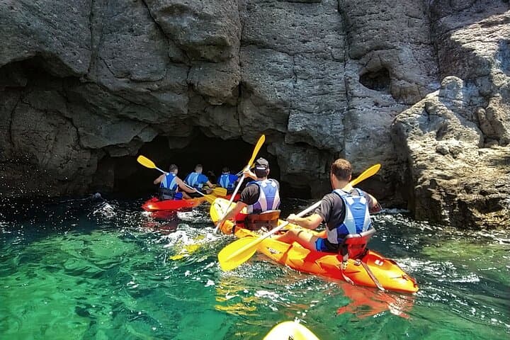 Kayak around the Mogan Caves and Cliffs